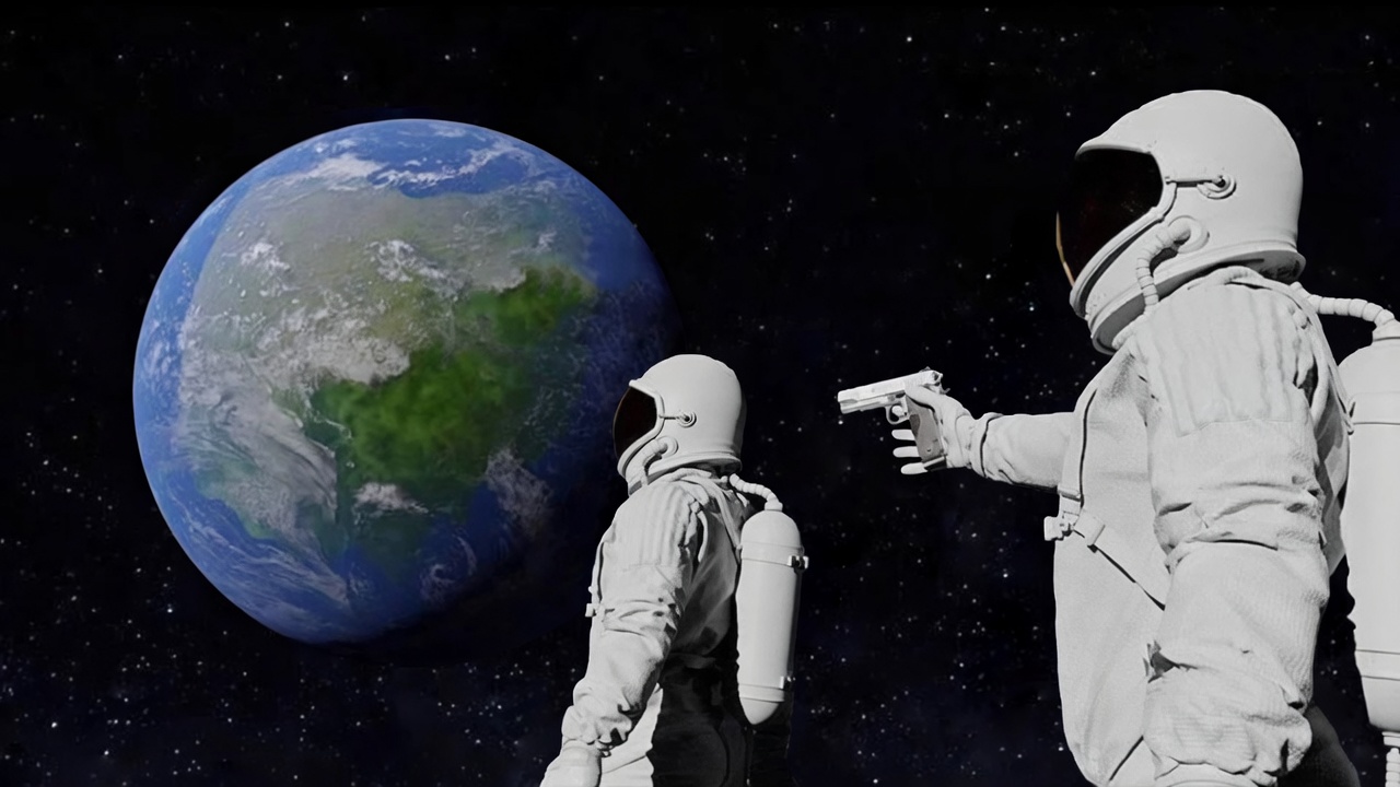 Two white-suited astronauts float in starry black space with Earth (showing green landmasses and blue oceans) large in the background on the left. The left astronaut faces Earth with back partly to viewer. The right astronaut faces left, arm extended, pointing a handgun at the left astronaut’s helmet. Both wear American flag patches.
