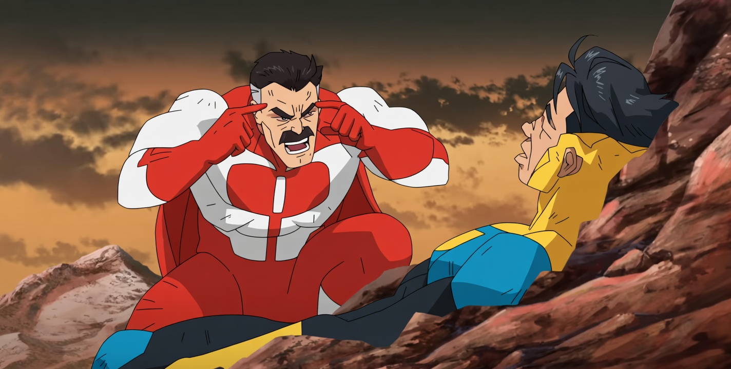 A muscular mustached man in a red-and-white superhero suit with a cape crouches and angrily points both index fingers at his temples while shouting. To his right, a younger man in a yellow-and-blue suit is slammed against reddish rocky terrain, face contorted in pain and distress. The background is a dramatic cloudy orange sky over mountains.