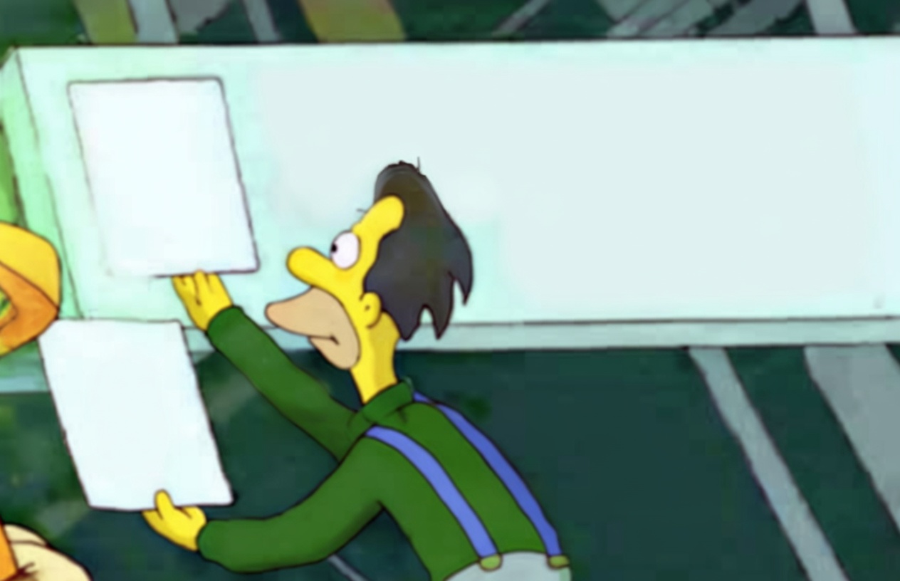A yellow-skinned cartoon man (Lenny from The Simpsons) in a green shirt with blue suspenders stands in profile, smiling slightly while pinning a blank white square sheet onto a light-colored board. He holds another blank white sheet in his other hand. A large empty horizontal white rectangular panel dominates the right side of the frame. The background is a dark green surface with faint white lines.