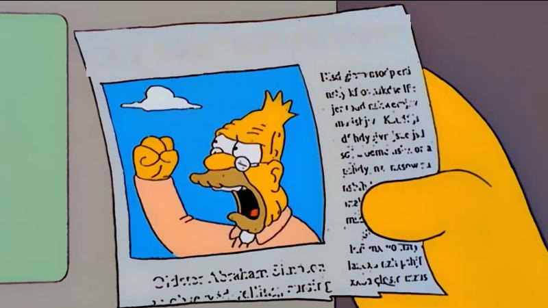 A large yellow cartoon hand holds a slightly tilted newspaper clipping against a gray-purple wall, with a pale green panel at the left edge. The clipping’s headline bar is blank for a new headline; in the original it reads “OLD MAN YELLS AT CLOUD.” Under it, a photo shows an elderly yellow-skinned cartoon man with sparse hair, round glasses, a mustache, and an open shouting mouth, fist raised toward a small white cloud in a blue sky. He wears a peach shirt. Tiny illegible article text fills the right side of the page, and a small photo credit runs along the bottom.