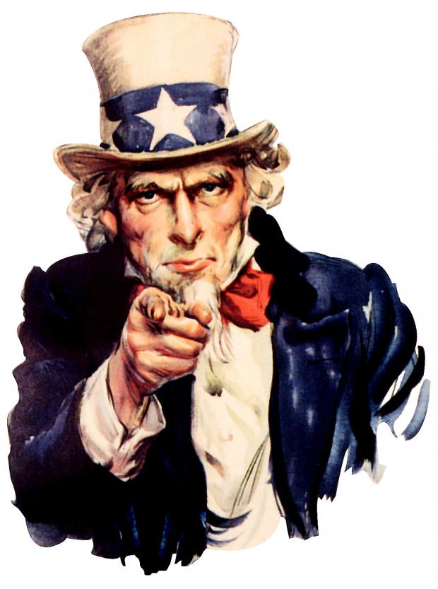 A painted illustration of a stern older man with white wavy hair, a white goatee, and furrowed brows, staring straight out and pointing his index finger directly at the viewer. He wears a tall off-white top hat with a dark blue band and a large white star, a red bow tie, a white shirt, and a dark blue coat with loose brushy edges. The figure is isolated on a plain white background, with the pointing hand large in the foreground.